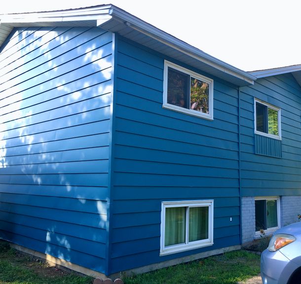 Freshly painted blue house